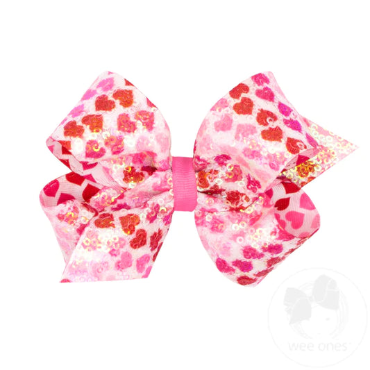 MED SEQUINS HEART BOW