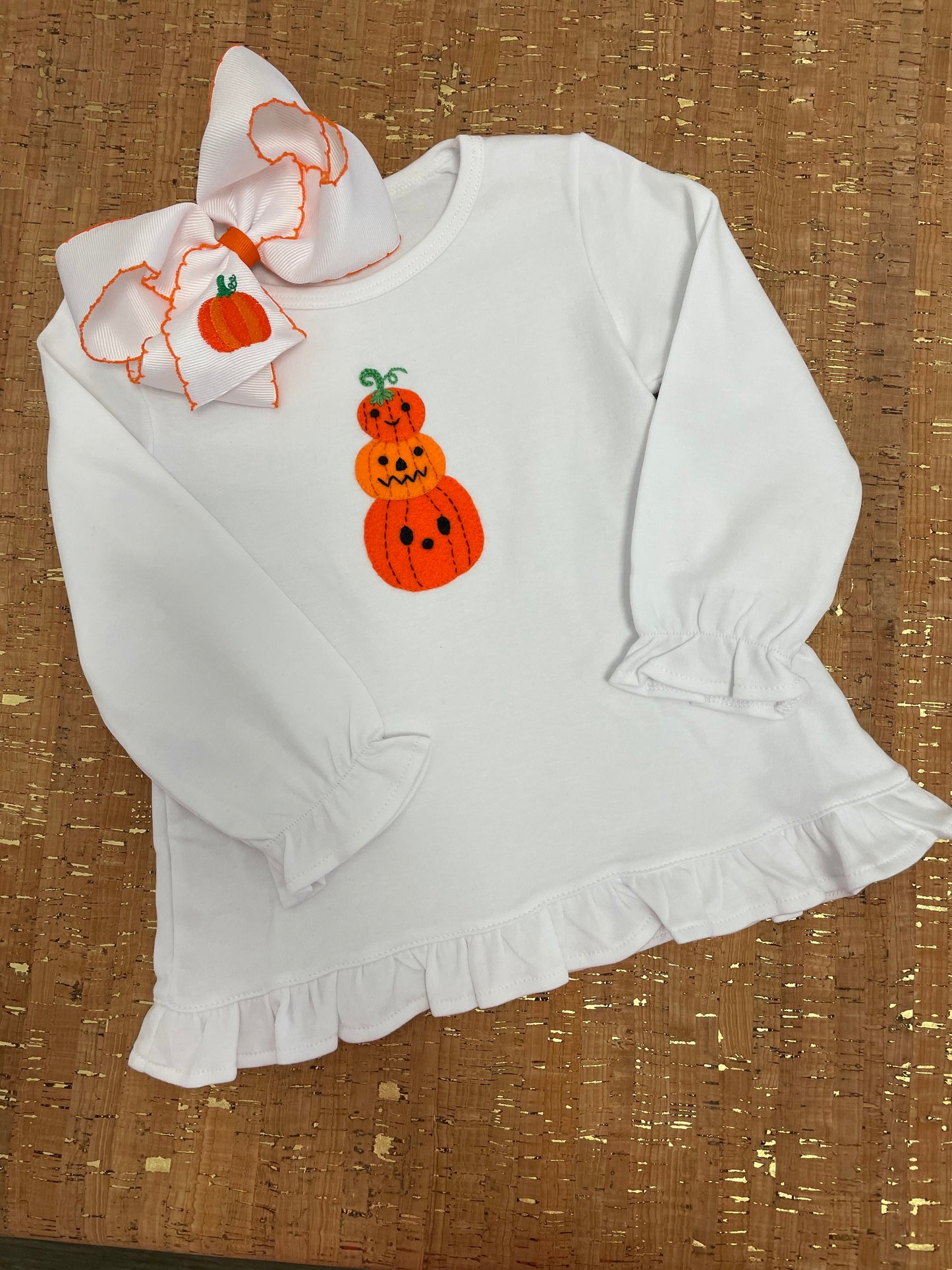 STACKED PUMPKINS RUFFLE TOP