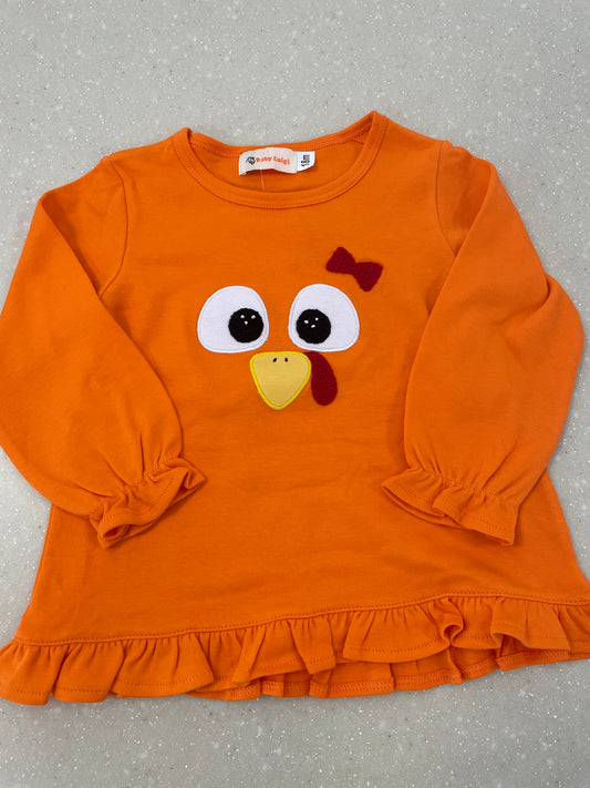 TURKEY EYES RUFFLE TOP